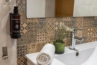 Un baño de Waou Apartamentos en Sol Confort 3