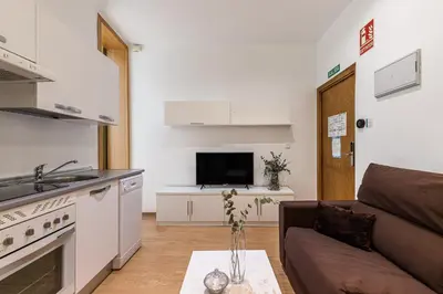 Una cocina o zona de cocina en Waou Apartamentos en Sol Confort 4