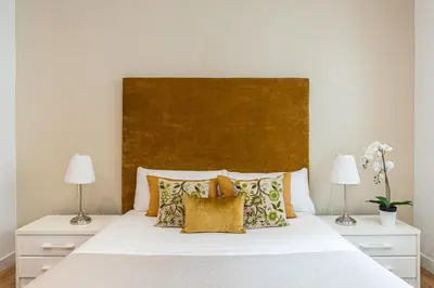 Cama o camas de una habitación en Waou Apartamentos en Sol Confort 5