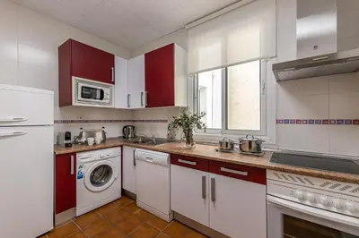 Una cocina o zona de cocina en Waou Apartamentos en Sol Confort 5
