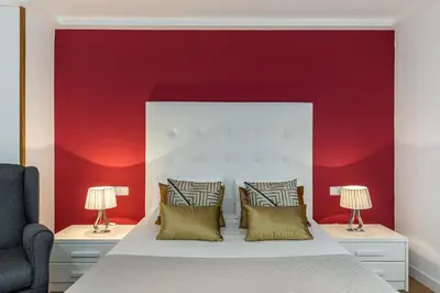 Cama o camas de una habitación en Waou Apartamentos en Sol Confort 6