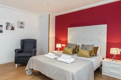 Cama o camas de una habitación en Waou Apartamentos en Sol Confort 6