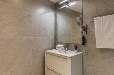 Un baño de Waou Apartamentos en Sol Confort 6