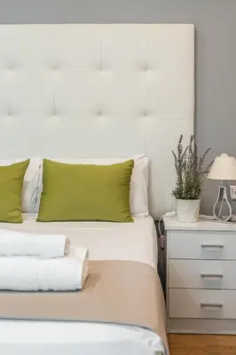 Cama o camas de una habitación en Waou Apartamentos en Sol Confort 7