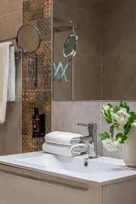 Un baño de Waou Apartamentos en Sol Confort 7