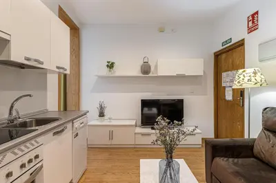Una cocina o zona de cocina en Waou Apartamentos en Sol Confort 7