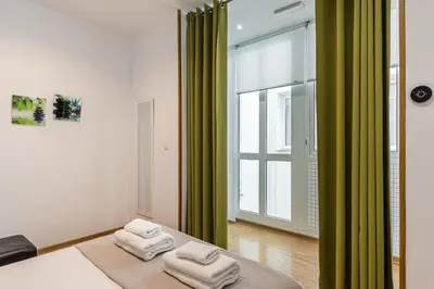 Cama o camas de una habitación en Waou Apartamentos en Sol Confort 7