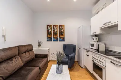 Una cocina o zona de cocina en Waou Apartamentos en Sol Confort 7