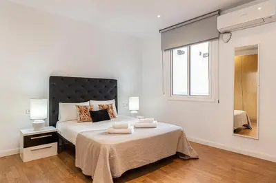Cama o camas de una habitación en Waou Apartamentos en Sol Confort 8