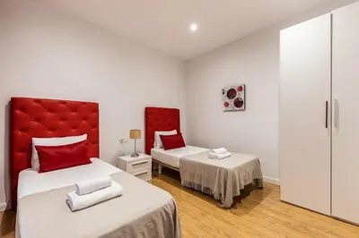Cama o camas de una habitación en Waou Apartamentos en Sol Confort 8