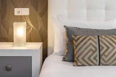 Cama o camas de una habitación en Waou Apartamentos en Sol Confort 9
