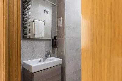 Un baño de Waou Apartamentos en Sol Confort 9