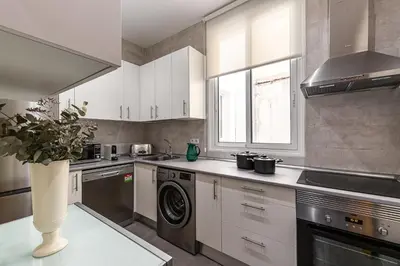 Una cocina o zona de cocina en Waou Apartamentos en Sol Confort 9