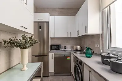 Una cocina o zona de cocina en Waou Apartamentos en Sol Confort 9