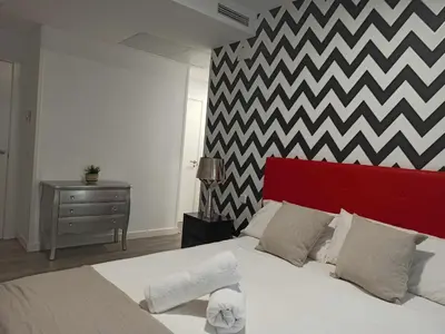 Cama o camas de una habitación en Gran Vía - Centro - Callao. Familiar
