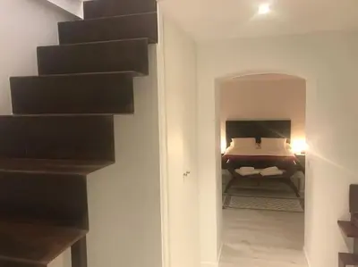 Cama o camas de una habitación en Preciosos apartamento cerca de Atocha CAN