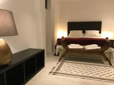 Cama o camas de una habitación en Preciosos apartamento cerca de Atocha CAN