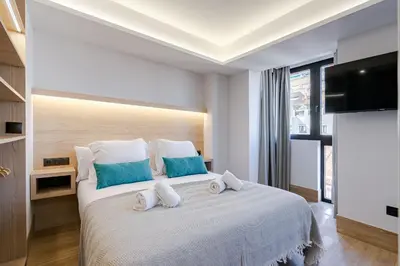Cama o camas de una habitación en Feelathome Ventas Suites