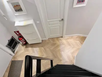 Una televisión o centro de entretenimiento en Encantador apartamento en Madrid centro