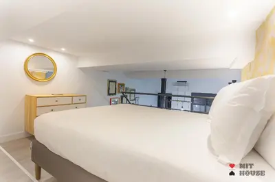 Cama o camas de una habitación en Apartamento Bernabeu Loft en Madrid