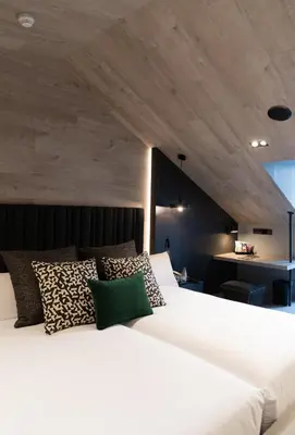 Cama o camas de una habitación en Hotel Regina
