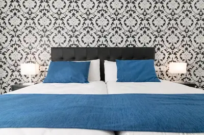 Cama o camas de una habitación en Hostal Boutique I Host You