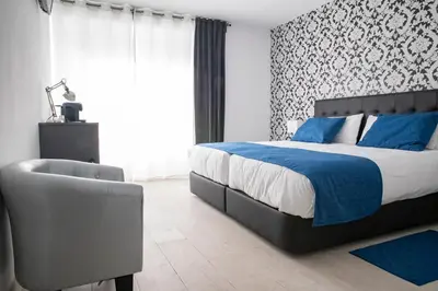 Cama o camas de una habitación en Hostal Boutique I Host You