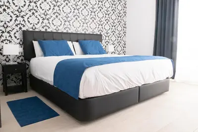 Cama o camas de una habitación en Hostal Boutique I Host You