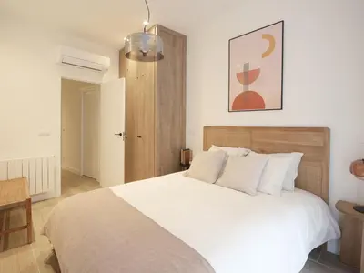 Cama o camas de una habitación en Luxury Flat next to Gran Via Madrid