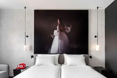 Cama o camas de una habitación en Radisson RED Madrid