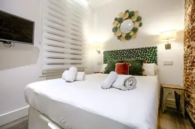 Cama o camas de una habitación en Madrid Atocha - Apartamento de 2 dormitorios