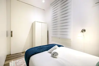 Cama o camas de una habitación en Madrid Atocha - Apartamento de 2 dormitorios