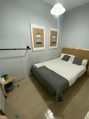 Cama o camas de una habitación en Center Madrid habitaciones