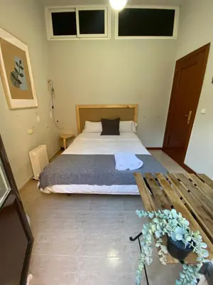 Cama o camas de una habitación en Center Madrid habitaciones