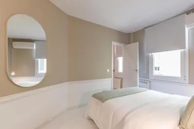 Cama o camas de una habitación en Apartamento Embajadores VII