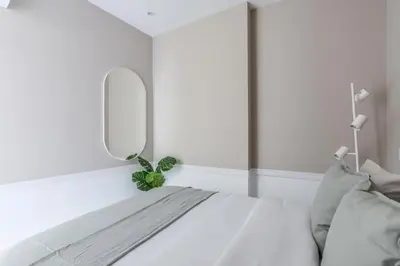 Cama o camas de una habitación en Apartamento Embajadores V