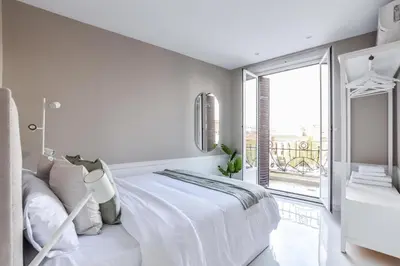 Cama o camas de una habitación en Apartamento Embajadores V