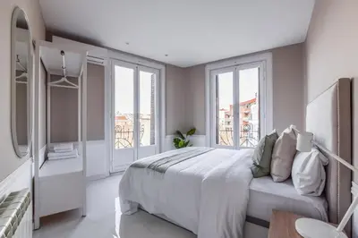 Cama o camas de una habitación en Apartamento Embajadores V