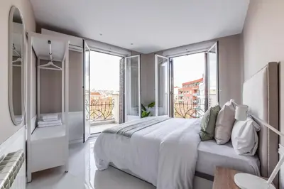 Cama o camas de una habitación en Apartamento Embajadores V