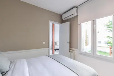 Cama o camas de una habitación en Apartamento Embajadores VI