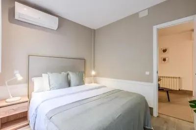 Cama o camas de una habitación en Apartamento Embajadores VIII