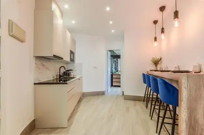 Una cocina o zona de cocina en Apartamento Embajadores VIII