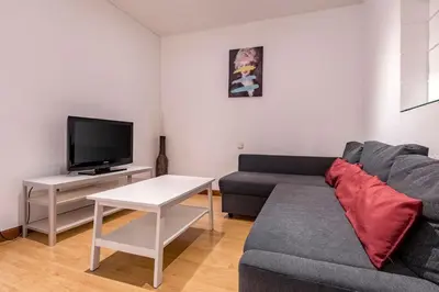 Una televisión o centro de entretenimiento en AVE Apartamento Madrid Centro Atocha