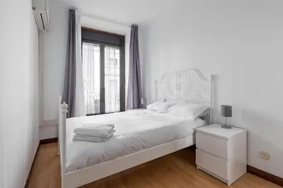Cama o camas de una habitación en AVE Apartamento Madrid Centro Atocha