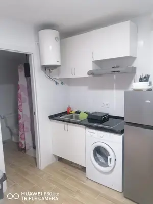 Una cocina o zona de cocina en Apartamento B-2