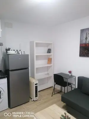 Una cocina o zona de cocina en Apartamento B-2