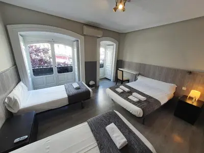 Cama o camas de una habitación en Plaza Dort Rooms IV