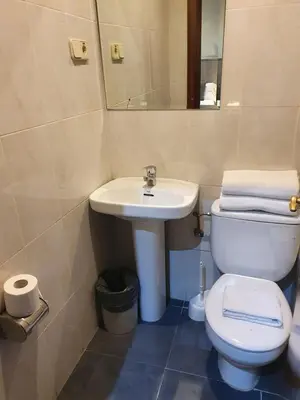 Un baño de Plaza Dort Rooms IV