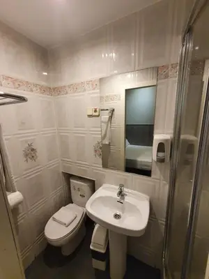 Un baño de Plaza Dort Rooms IV