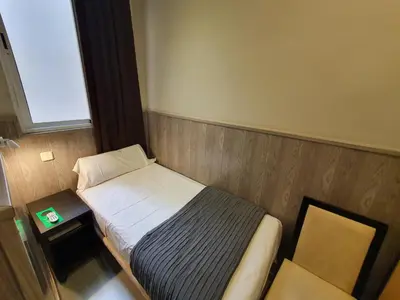 Cama o camas de una habitación en Plaza Dort Rooms IV